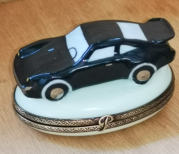 Black Porsche Limoges Diffusion